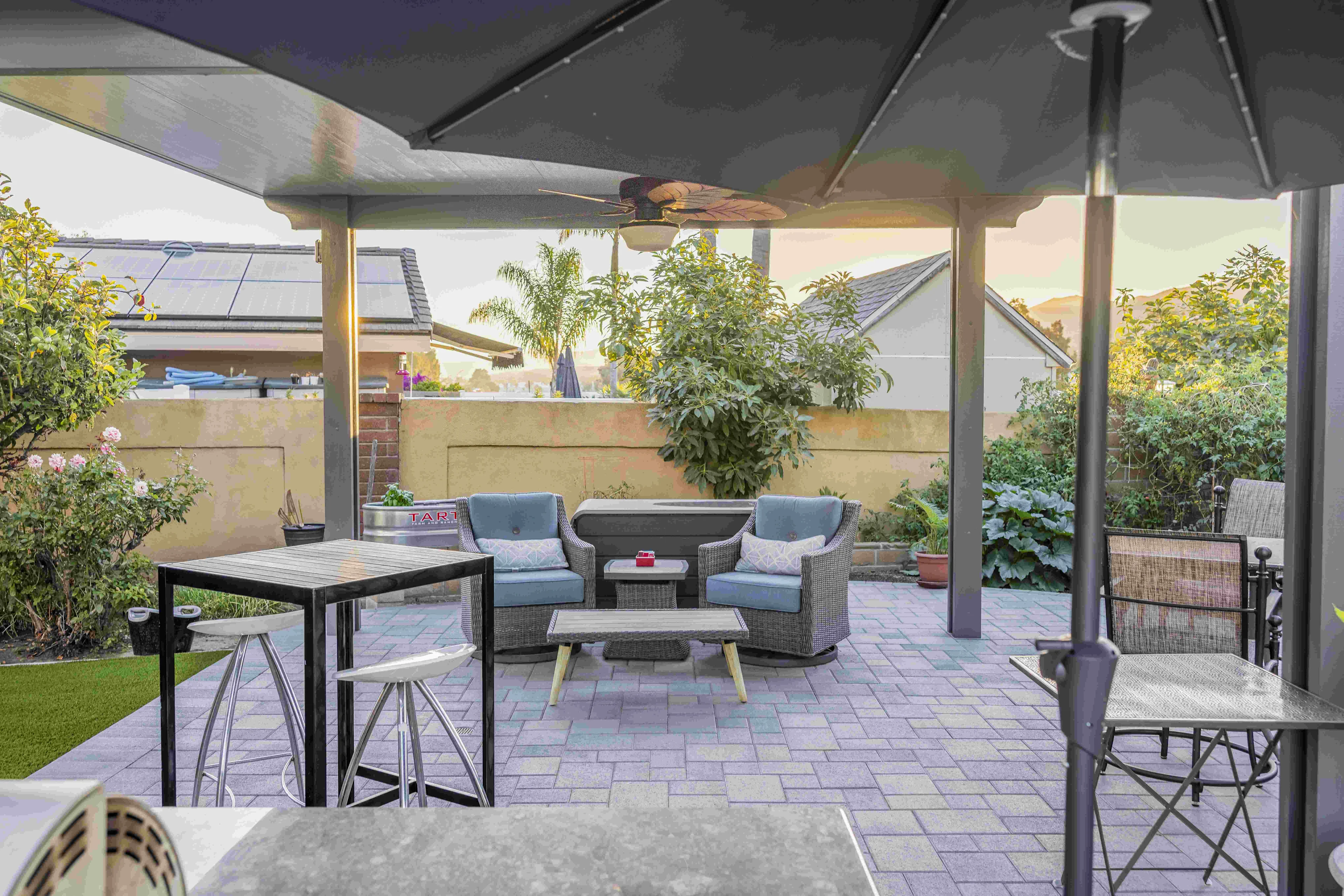 Pergola covered paver patio outdoor seating area