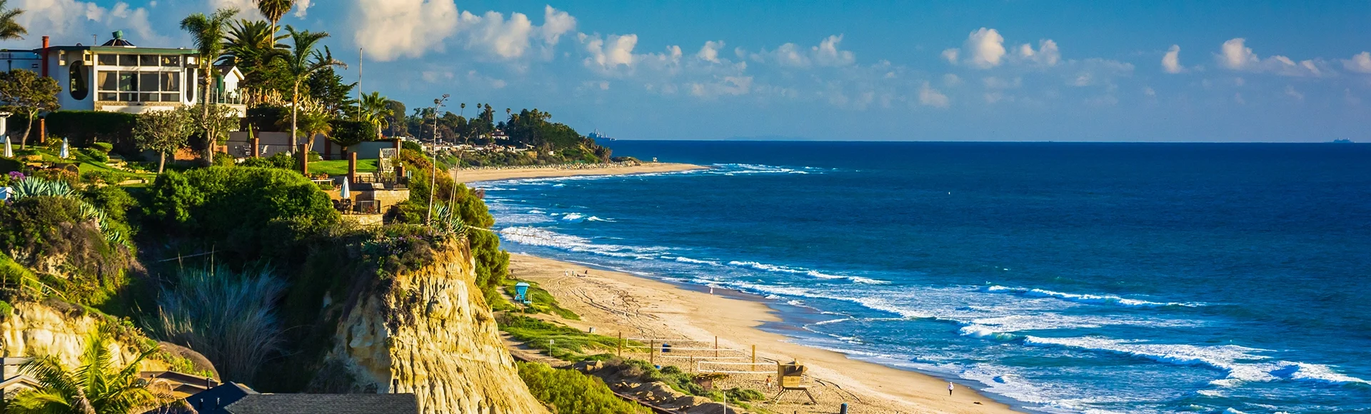 View of houses and the beach from a cliff in San Clemente, Calif