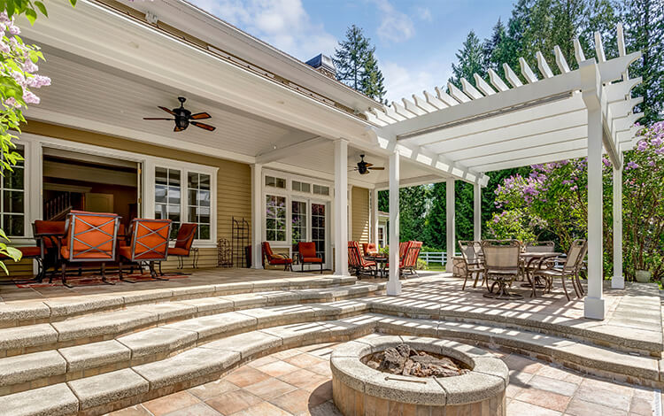 Pergola on a paver patio with built-in fire pit
