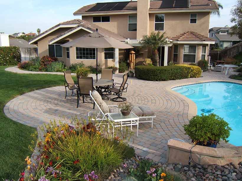 backyard with pavers and pool