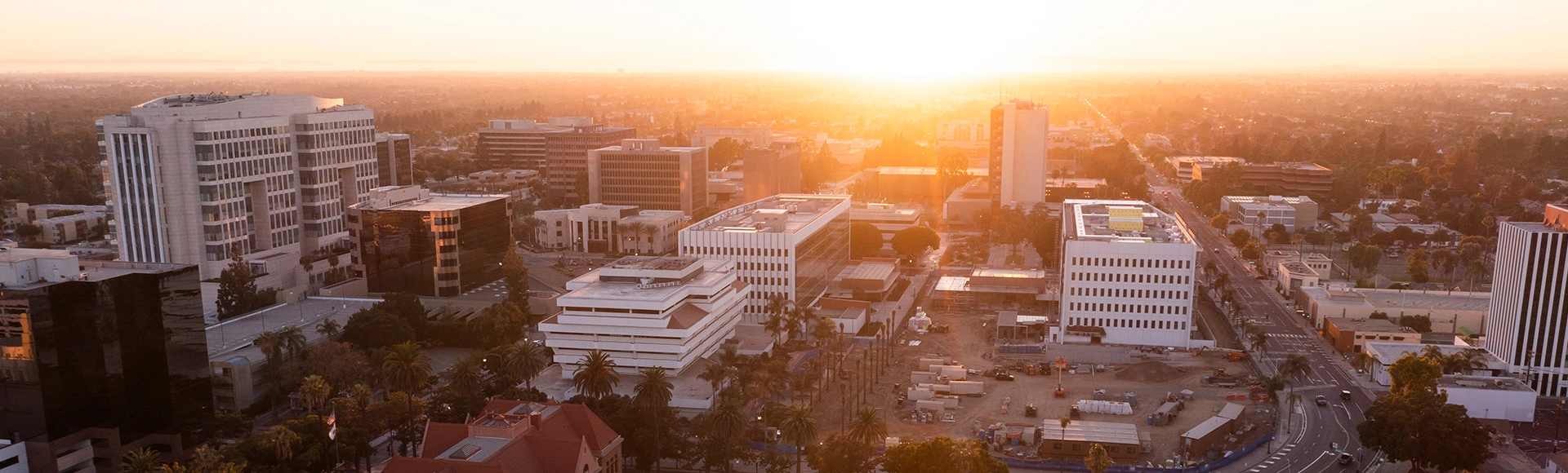 Sunset aerial view of the urban core of downtown Santa Ana, California, USA.