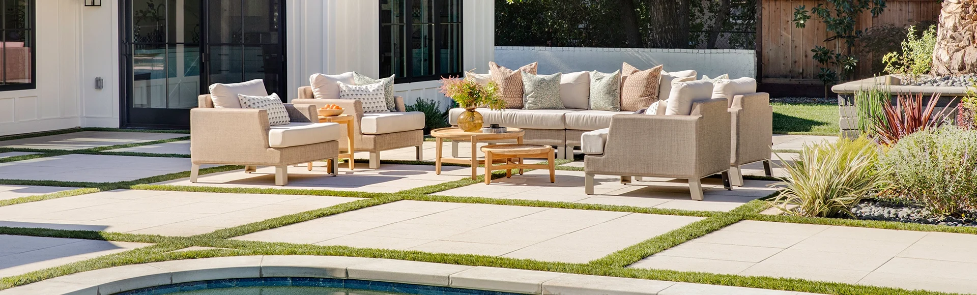 Backyard with pavers and patio furniture set