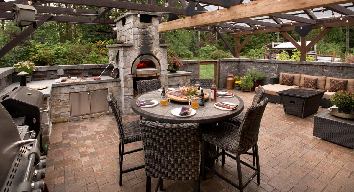 patio with pavers and outdoor kitchen