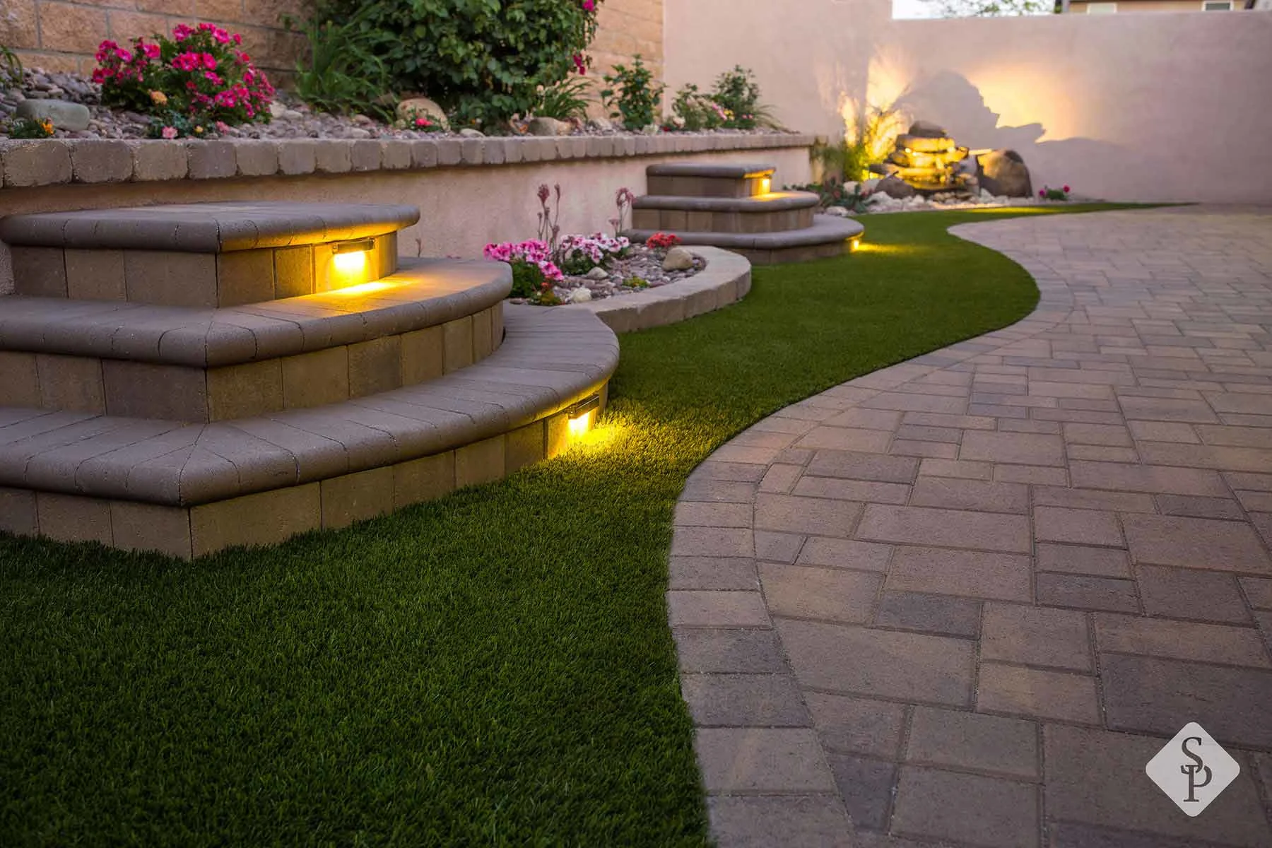 outdoor lighting, pavers and turf