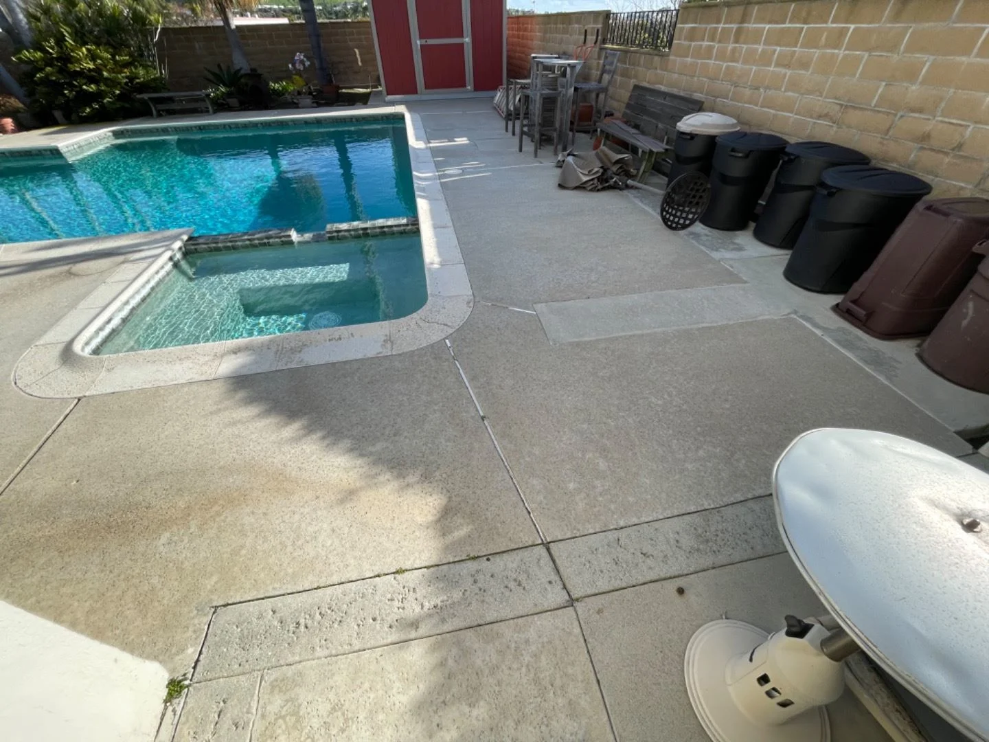 Concrete pool deck before paver upgrade