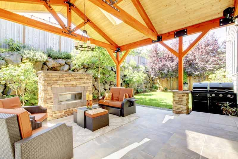 patio with pergola, fireplace, and grill