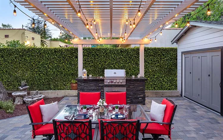 paver patio and pergola with lights