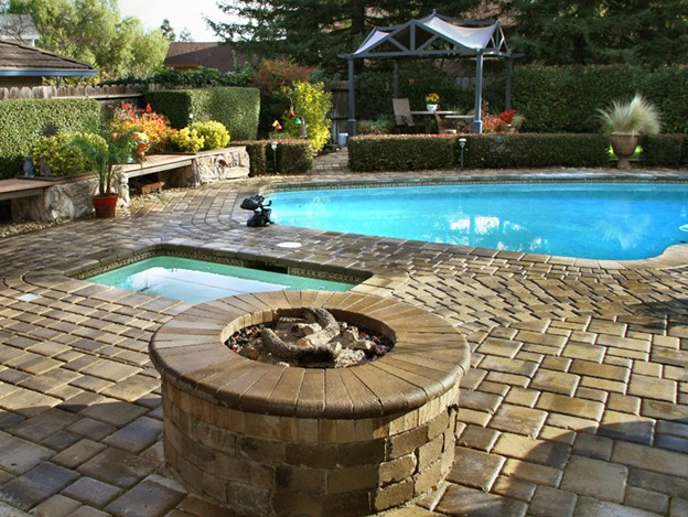 paver patio with fire pit and pool