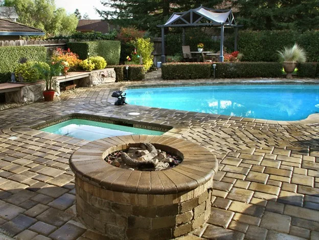 paver patio with fire pit and pool