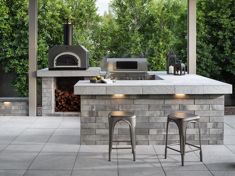 Outdoor kitchen with lights and built-in grills