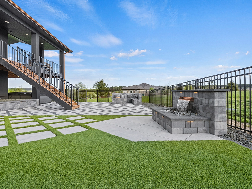 Artificial turf and paving stone lawn in Colorado. 