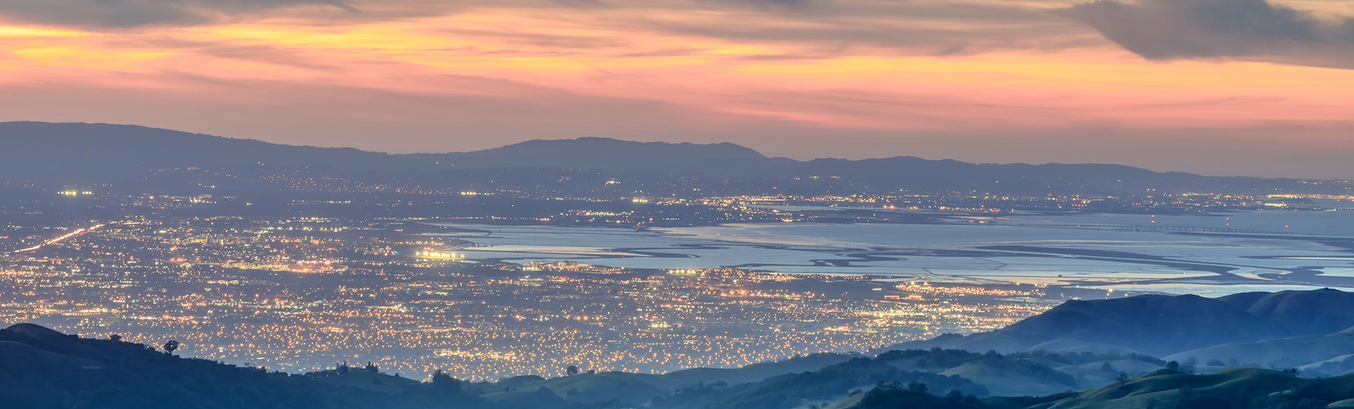 Silicon Valley Views from above. Santa Clara Valley at dusk as seen from Lick Observatory in Mount Hamilton east of San Jose, Santa Clara County, California, USA.