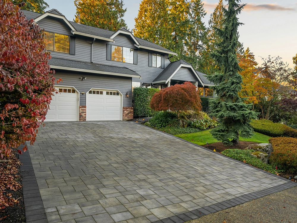 Paving stone driveway elevates a Seattle home.