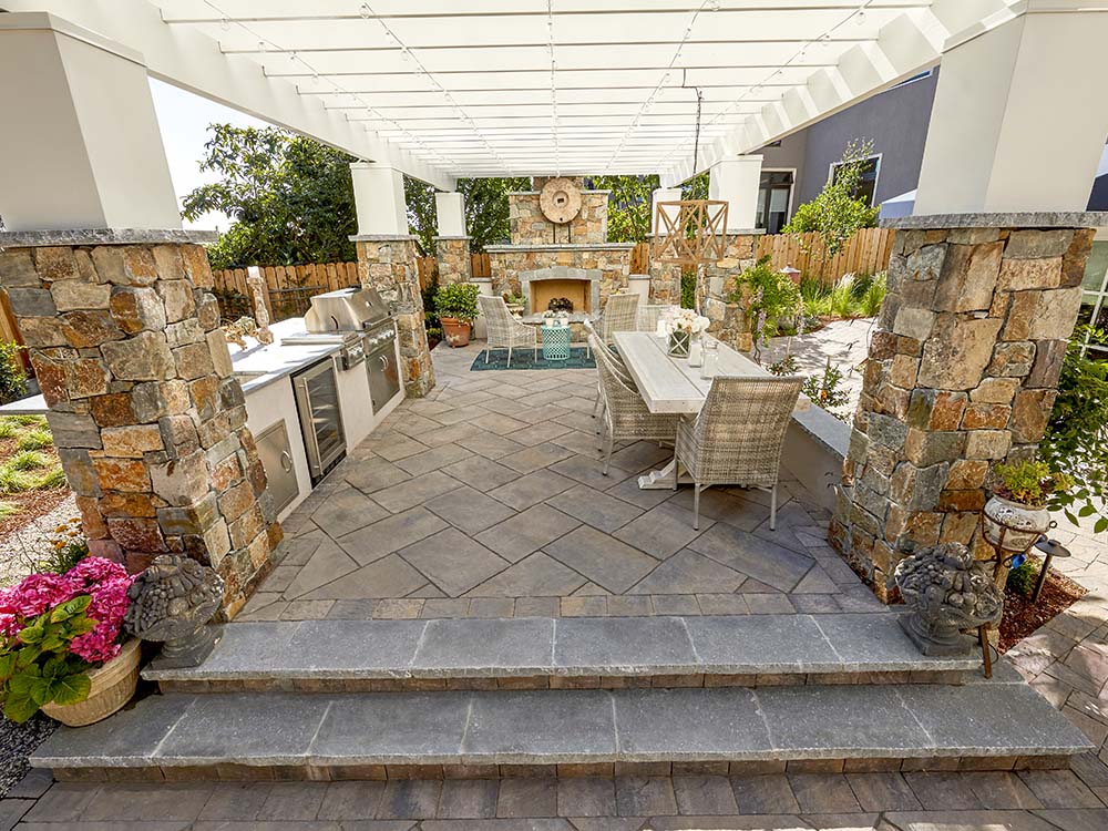 paver patio, outdoor kitchen, outdoor fireplace
