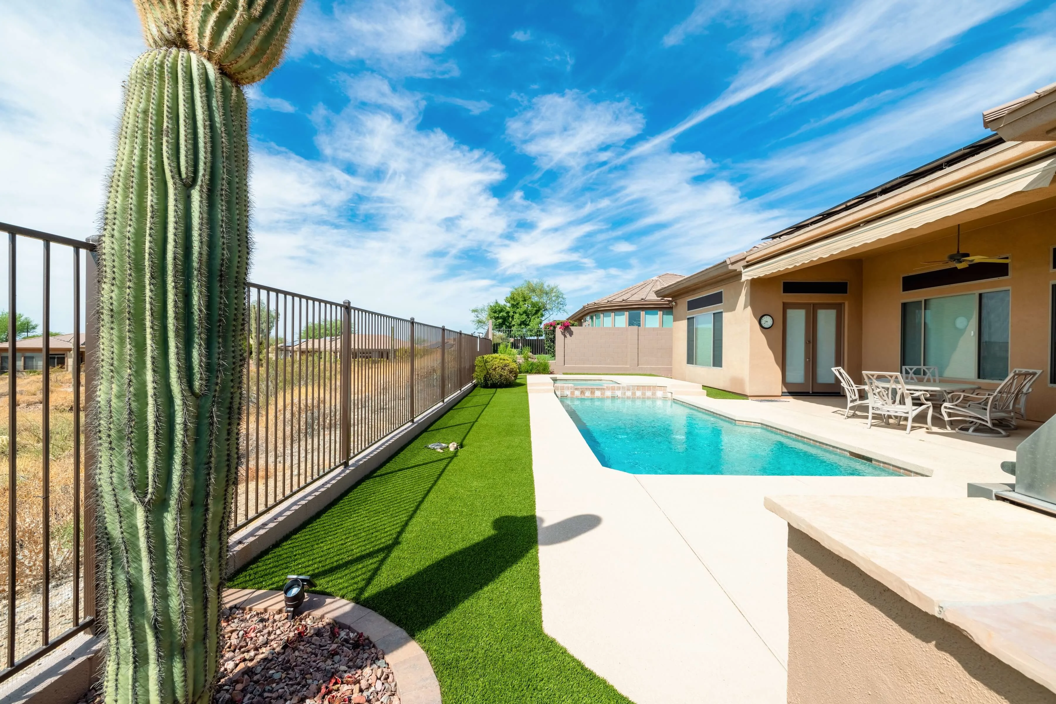 After Pic of Phoenix Arizona Backyard Turf by Pool