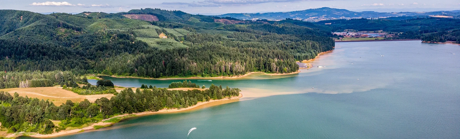 Aerial panoramic view at Henry Hagg Lake - an artificial lake in Washington county, Oregon. Popular place for summer activities