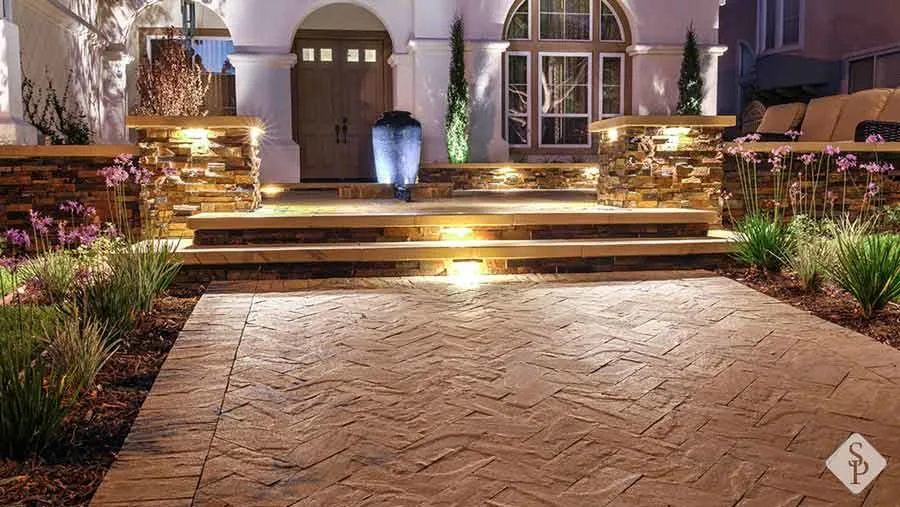 paver entryway with fountain