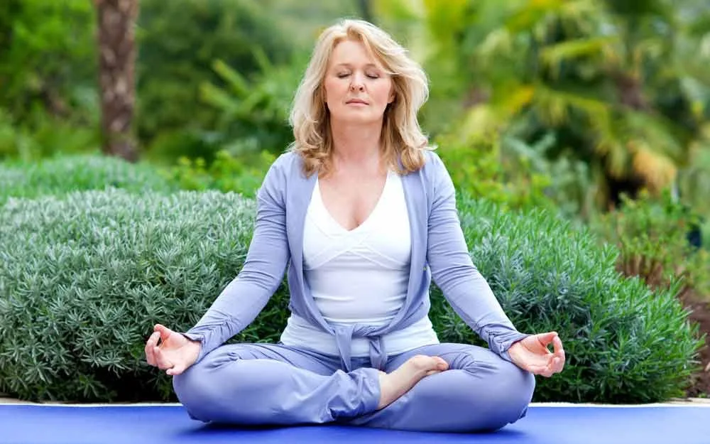 women doing yoga outside