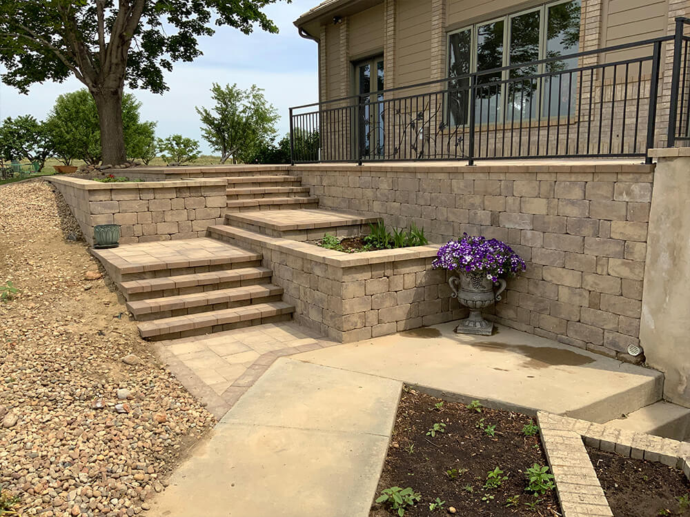 Grand custom paver stairs and built-in planters in Denver, Colorado
