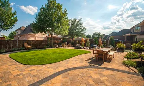 Patio, paver patio, backyard, artificial turf, walkway, landscape ideas, paving stones, patio furniture, dining, total outdoor transformation, universal region, daytime