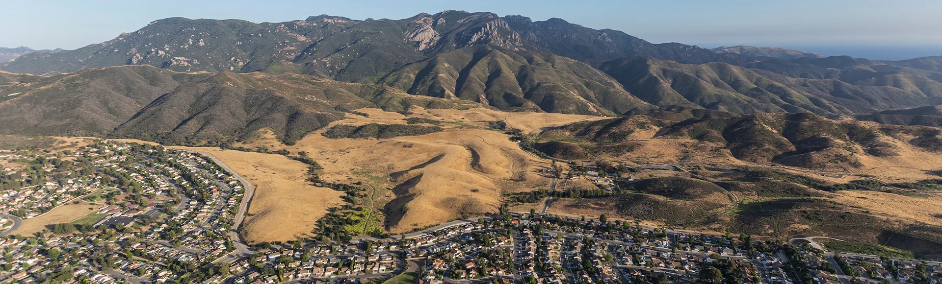 Aerial view of Mt Boney, Santa Monica Mountains National Recreation Area and Newbury Park neighborhoods in Ventura County California.