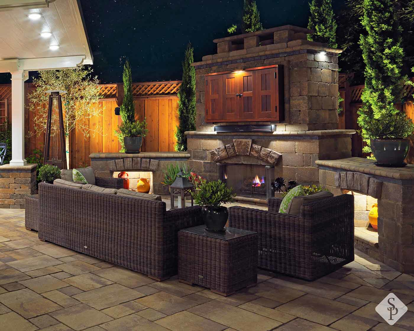 patio with pergola and fireplace