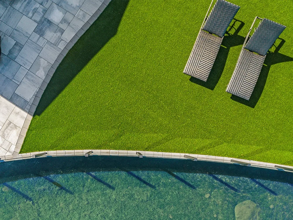Backyard turf upgrade by Outdoor Living Systems.