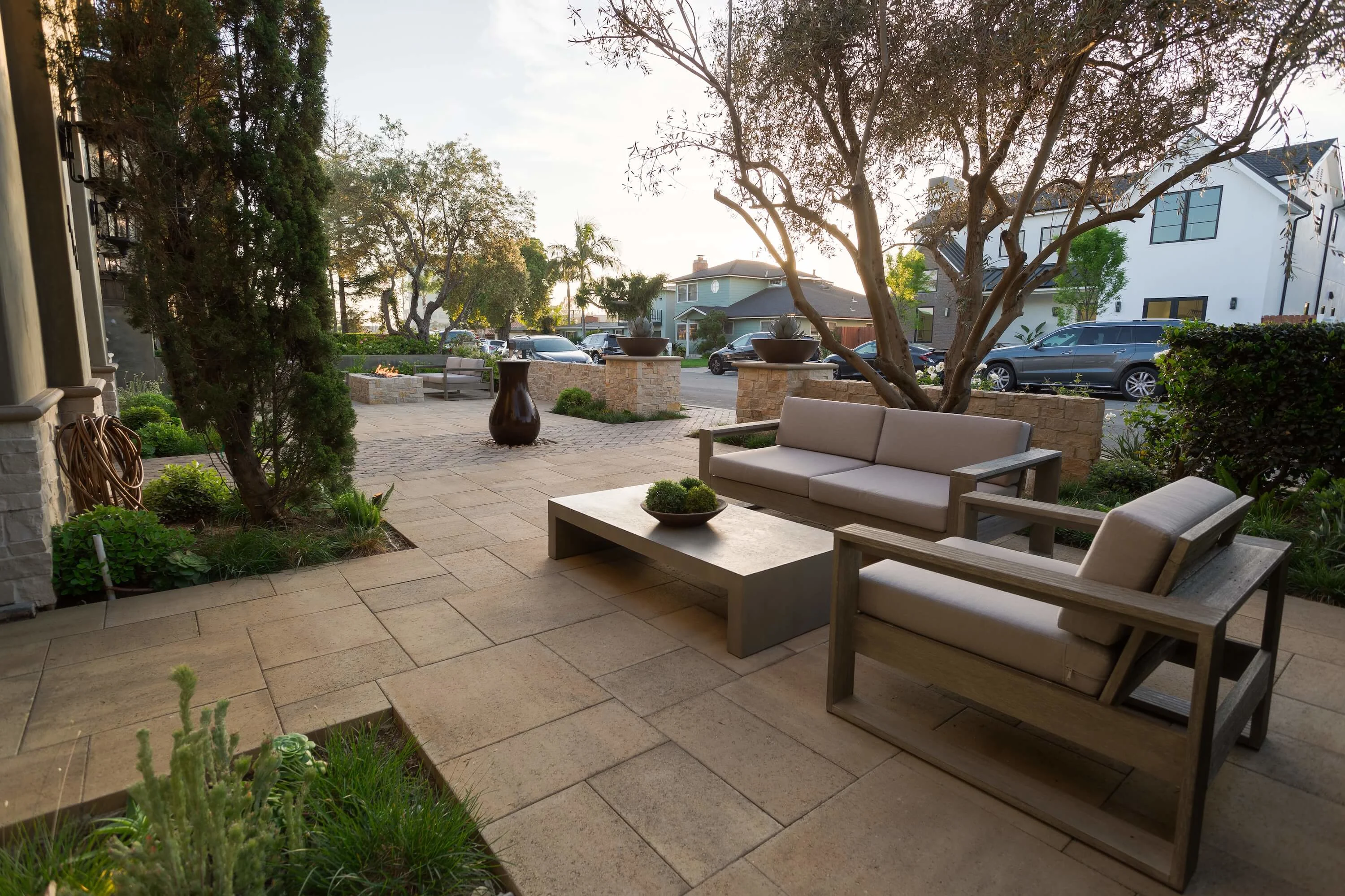 Front yard courtyard with paver patio seating area