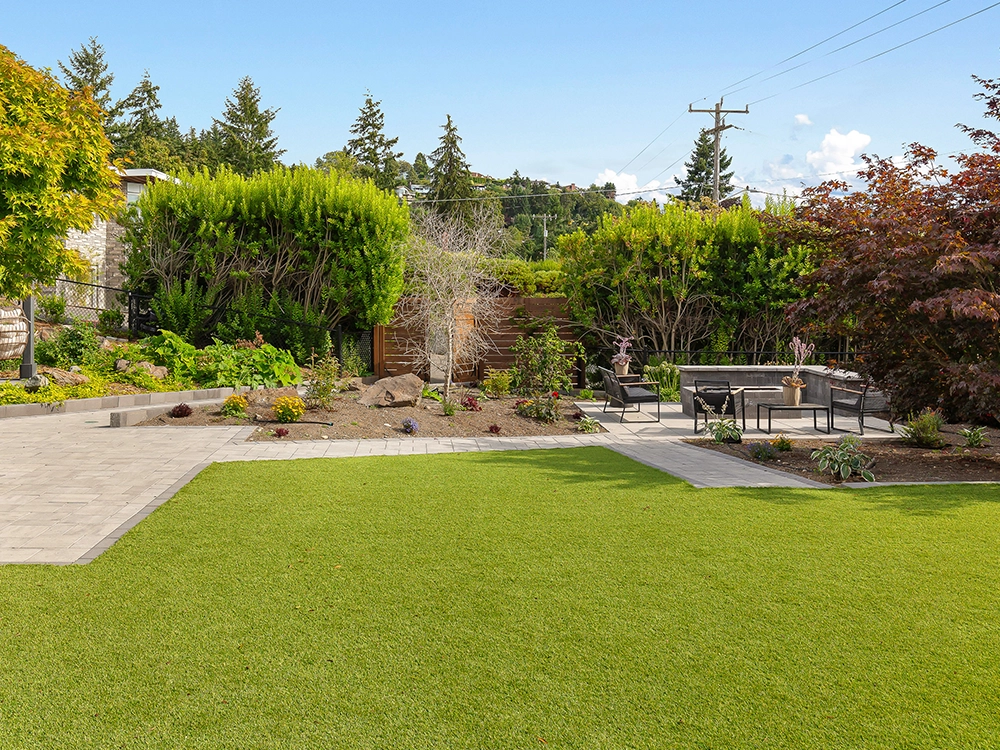 Large turf lawn installed by System Pavers