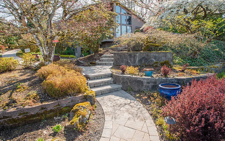 Front yard paving stone walkway with walls