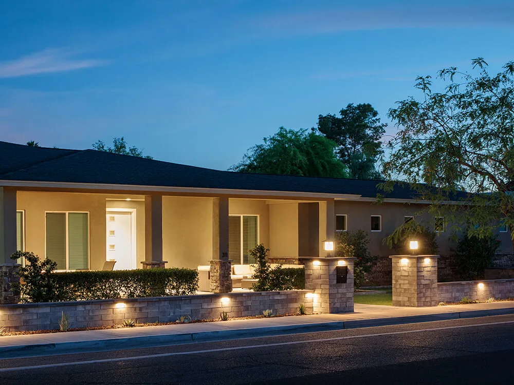 vegas lighting and walkway with built-in stone mailbox