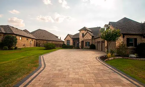 Driveway, driveway pavers, paving stones, walkway, border, paver design, front yard, curb appeal, Texas, universal region, daytime