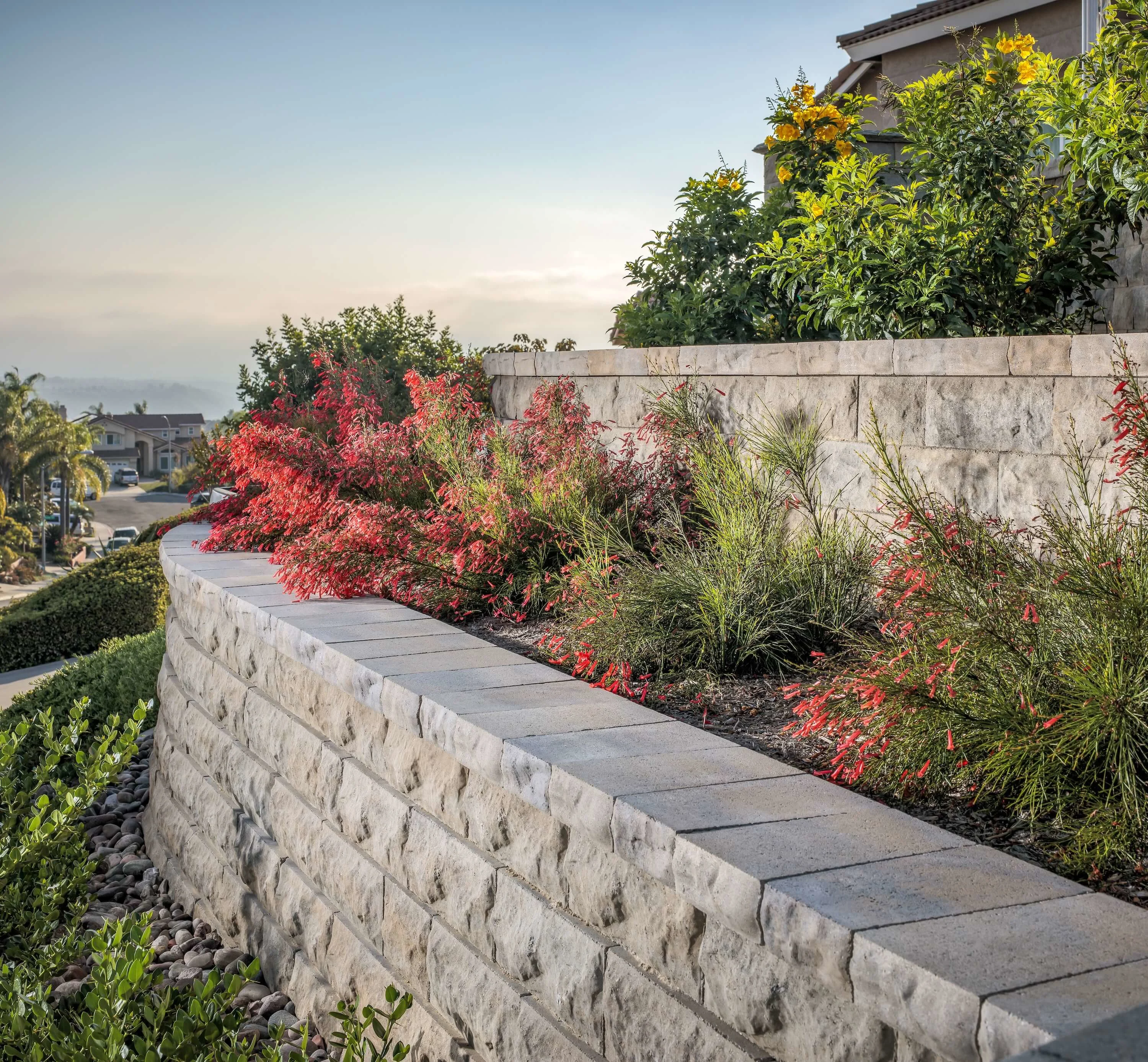 Stone retaining walls create gorgeous terraced landscaping