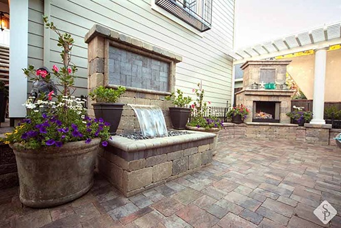 paver patio with waterfall