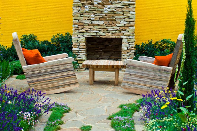 patio with outdoor fireplace