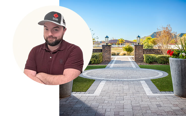 Sales Manager Jesse Davis with a paving stone walkway in Las Vegas, Nevada. Belguard stones with stone walls and planters. 