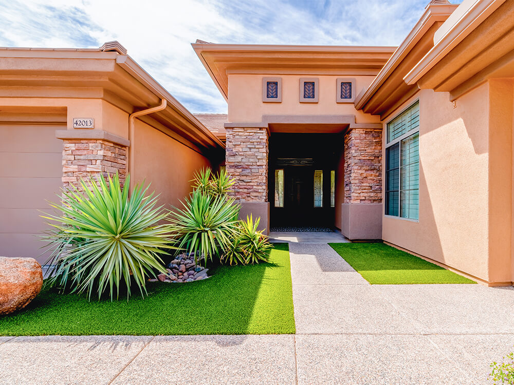 Front lawn with turf and pavers in AZ