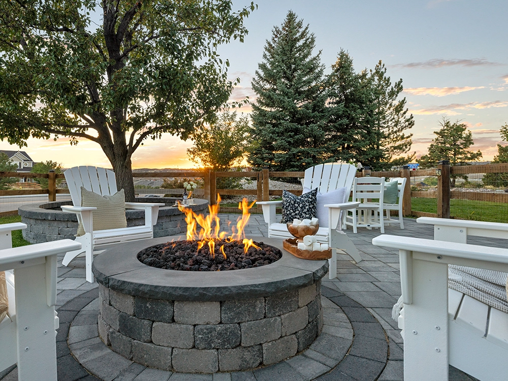 Lovely stone fire pit in a Colorado backyard. 