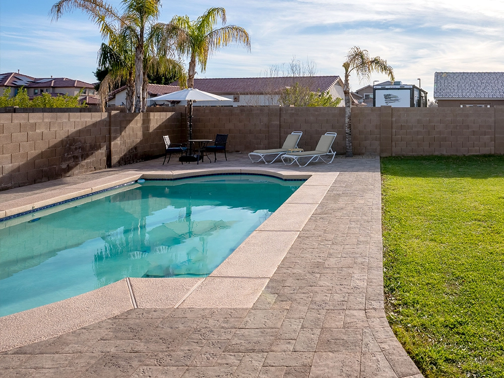 Backyard pool deck in Arizona.
