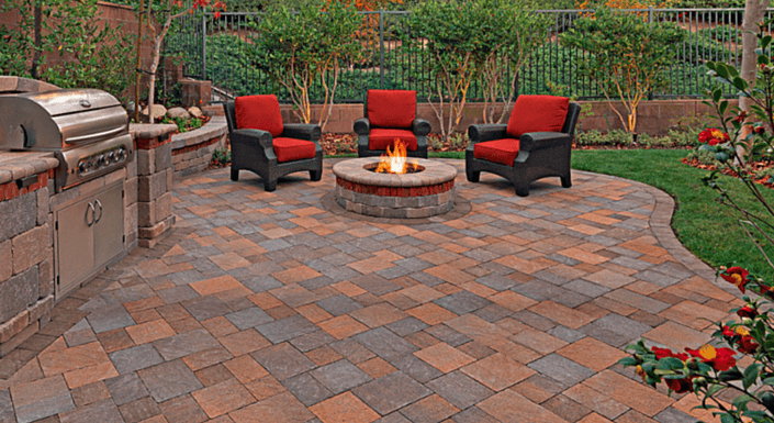 backyard pavers with grill and fire pit