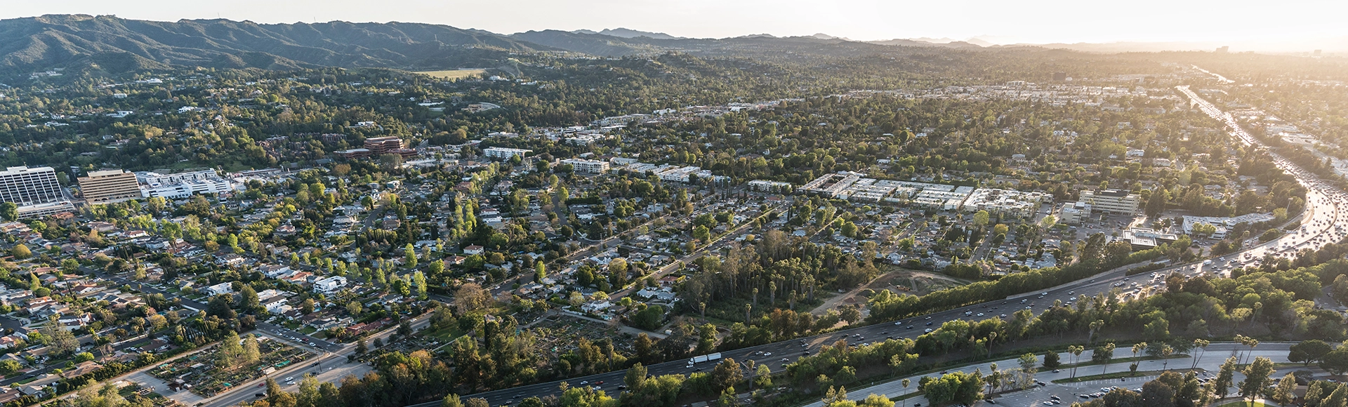 Late afternoon aerial view of the Ventura 101 freeway near the Sepulveda basin in the Encino area of the San Fernando Valley in Los Angeles, California