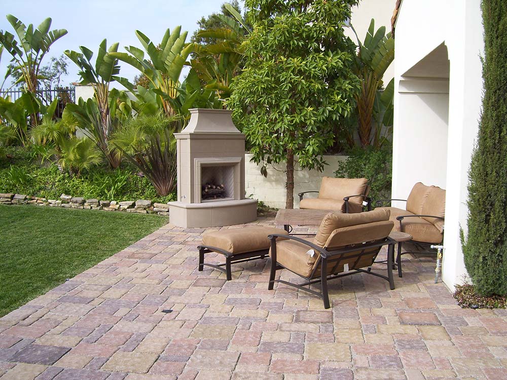 Outdoor fireplace, paver patio, patio furniture