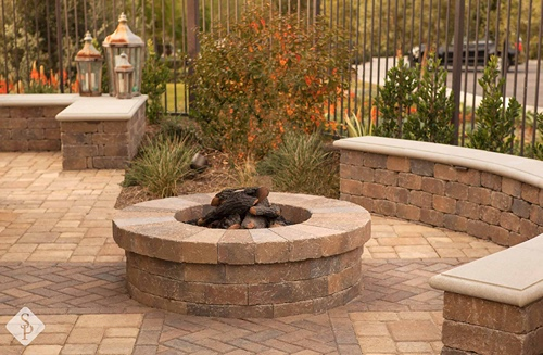 round fire pit on pavers