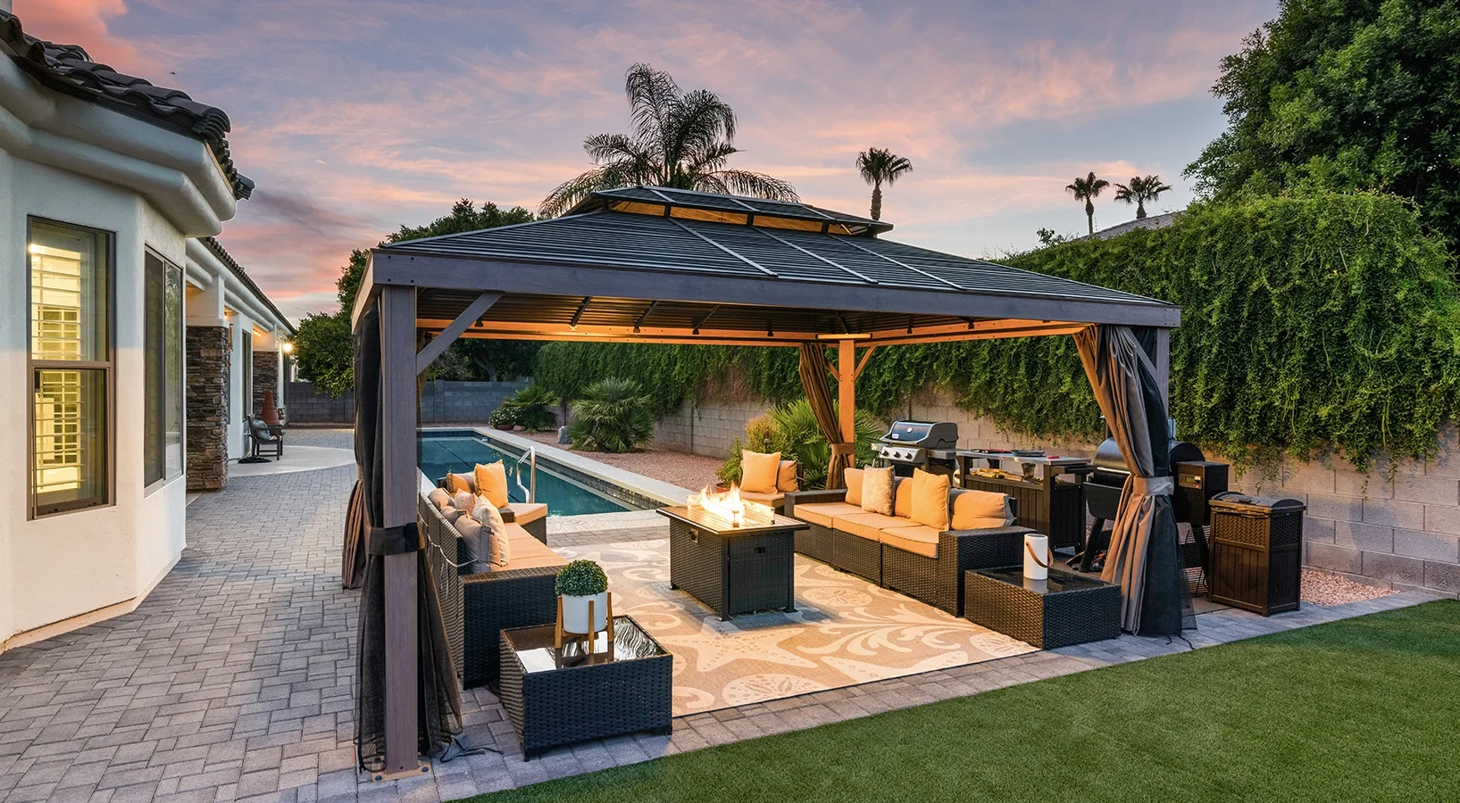 Paver patio and pool deck with pergola and fire pit