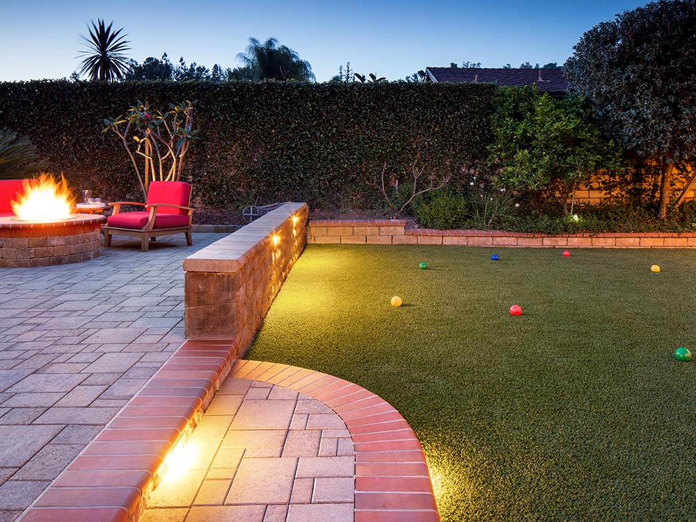 Outdoor lighting, fire pit, paver patio, turf yard