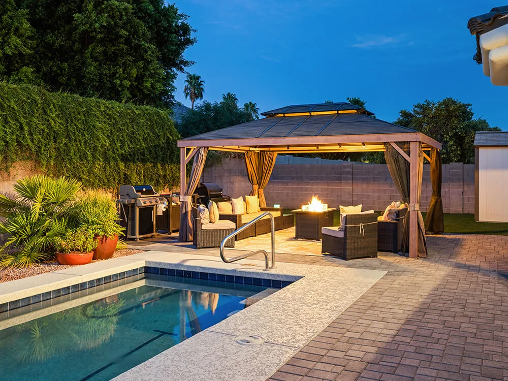 Pool deck and paver patio installed by System Pavers.