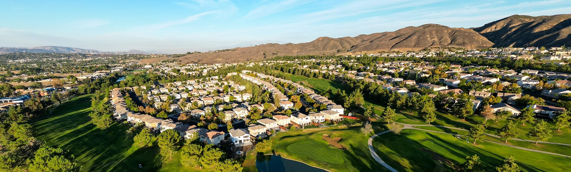An Aerial UAV Drone View of The City of Yucaipa, California, in Southern California, looking at the Yucaipa Golf Course