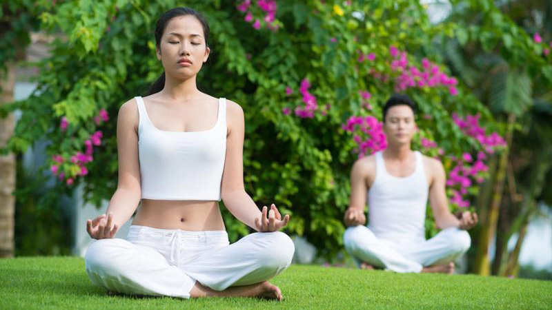 outdoor yoga on turf