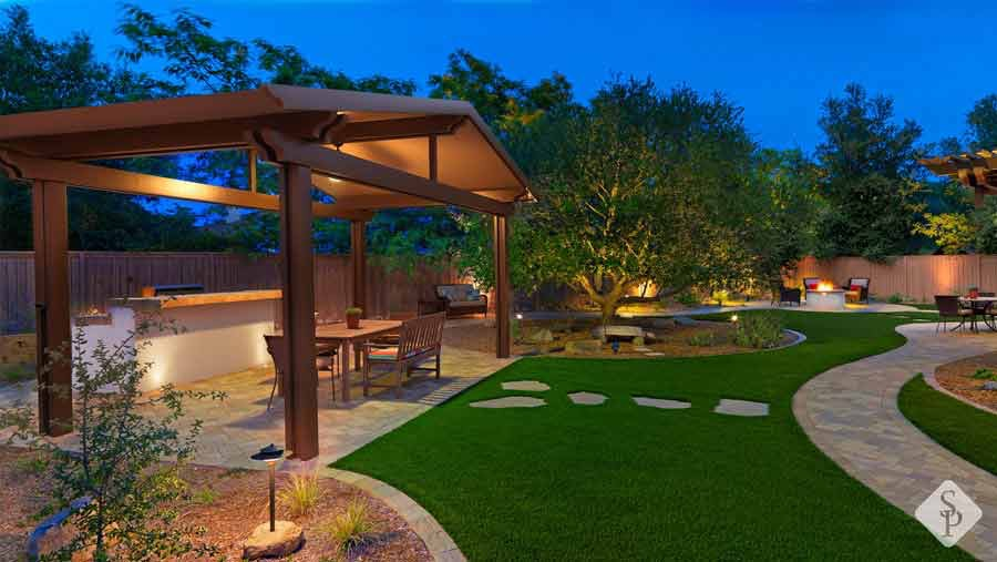 yard with turf and pavers