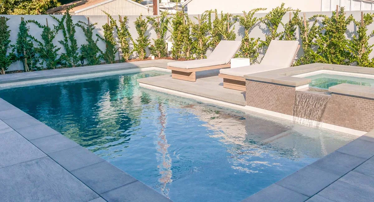 pool with pool deck pavers